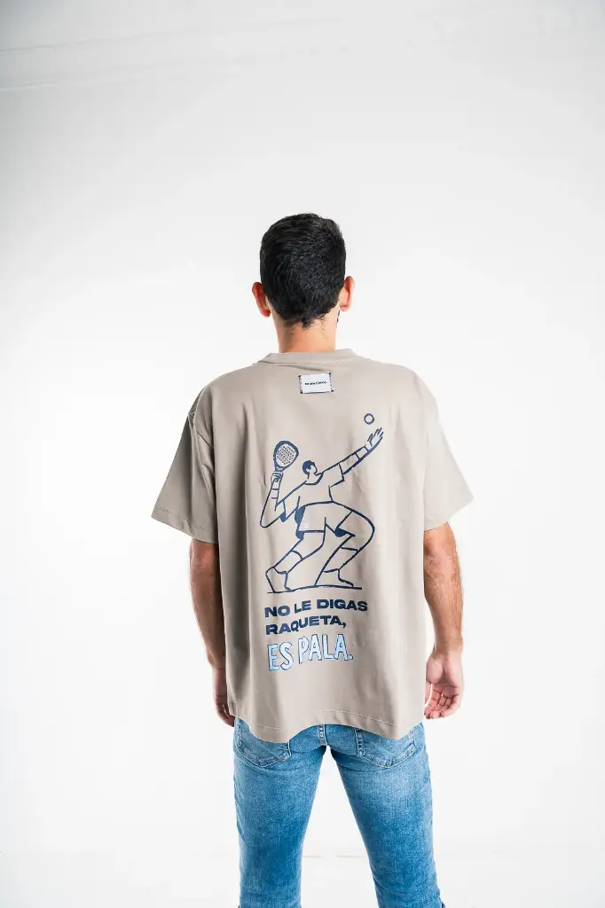Franela Oversized manga corta cuello redondo "No es Raqueta"